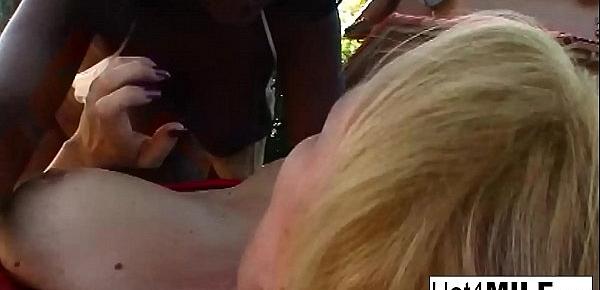  Interracial lesbian fun with two MILFs by the pool